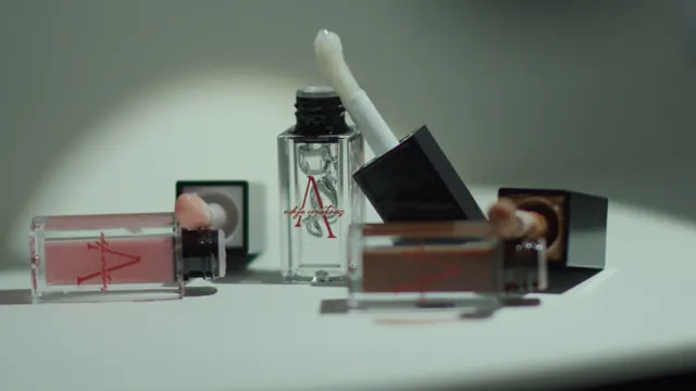 Adeja Creations lip products arranged in a shaft of sunlight.