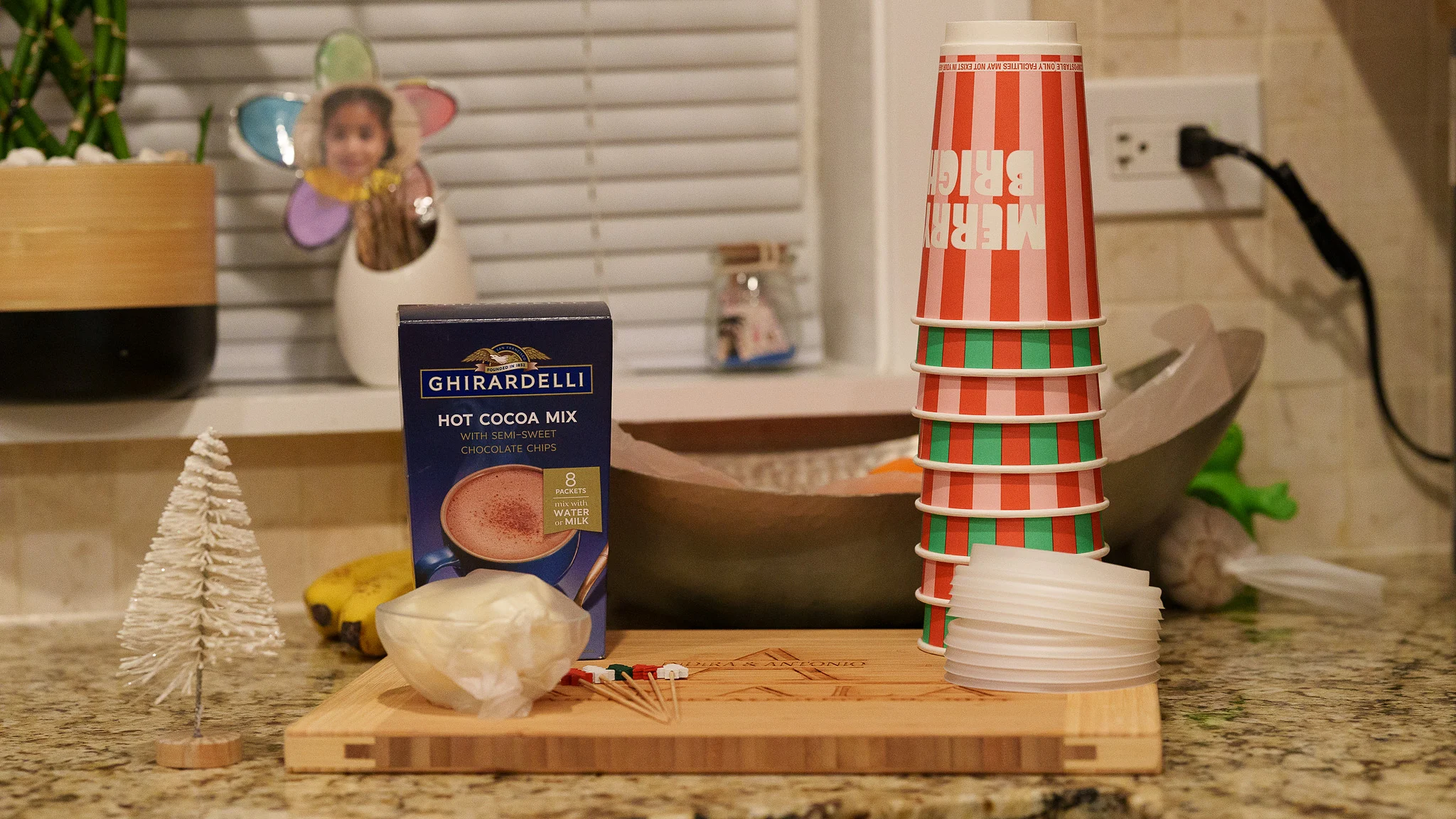 Cocoa and paper cups on the kitchen counter