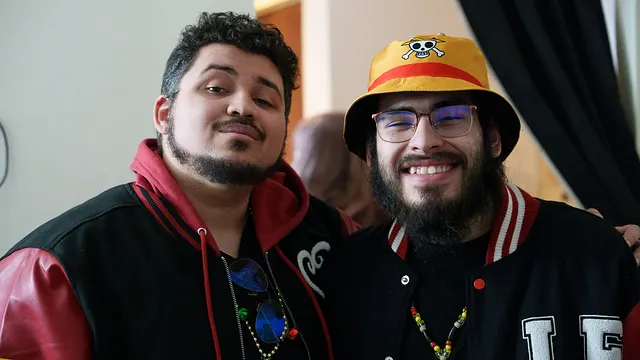 Two friends in matching jackets
