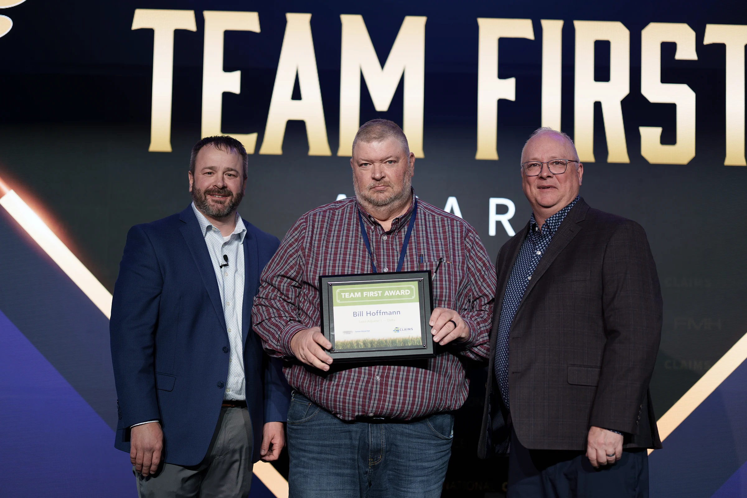 The Team First award on stage