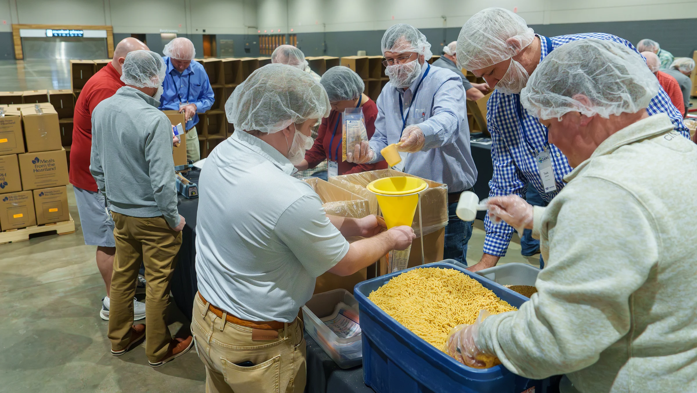 Volunteers packing meals