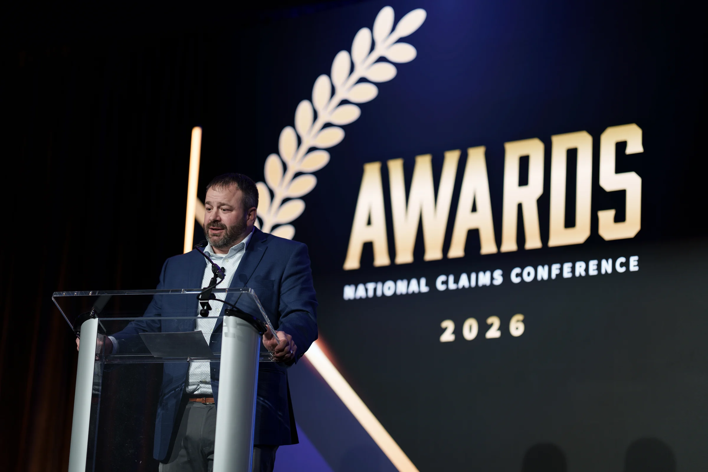 The awards screen and the podium