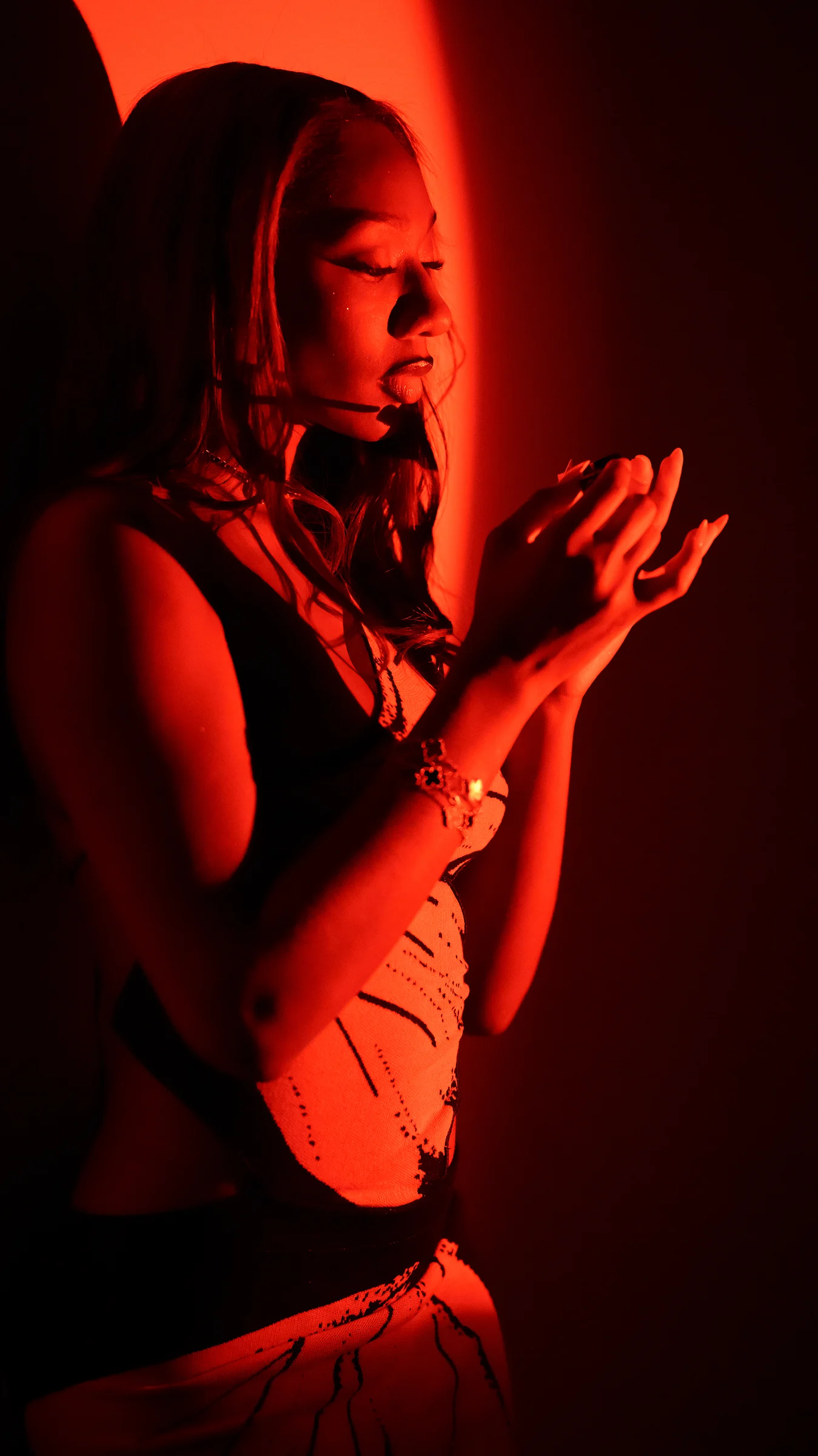 Red light, hands raised