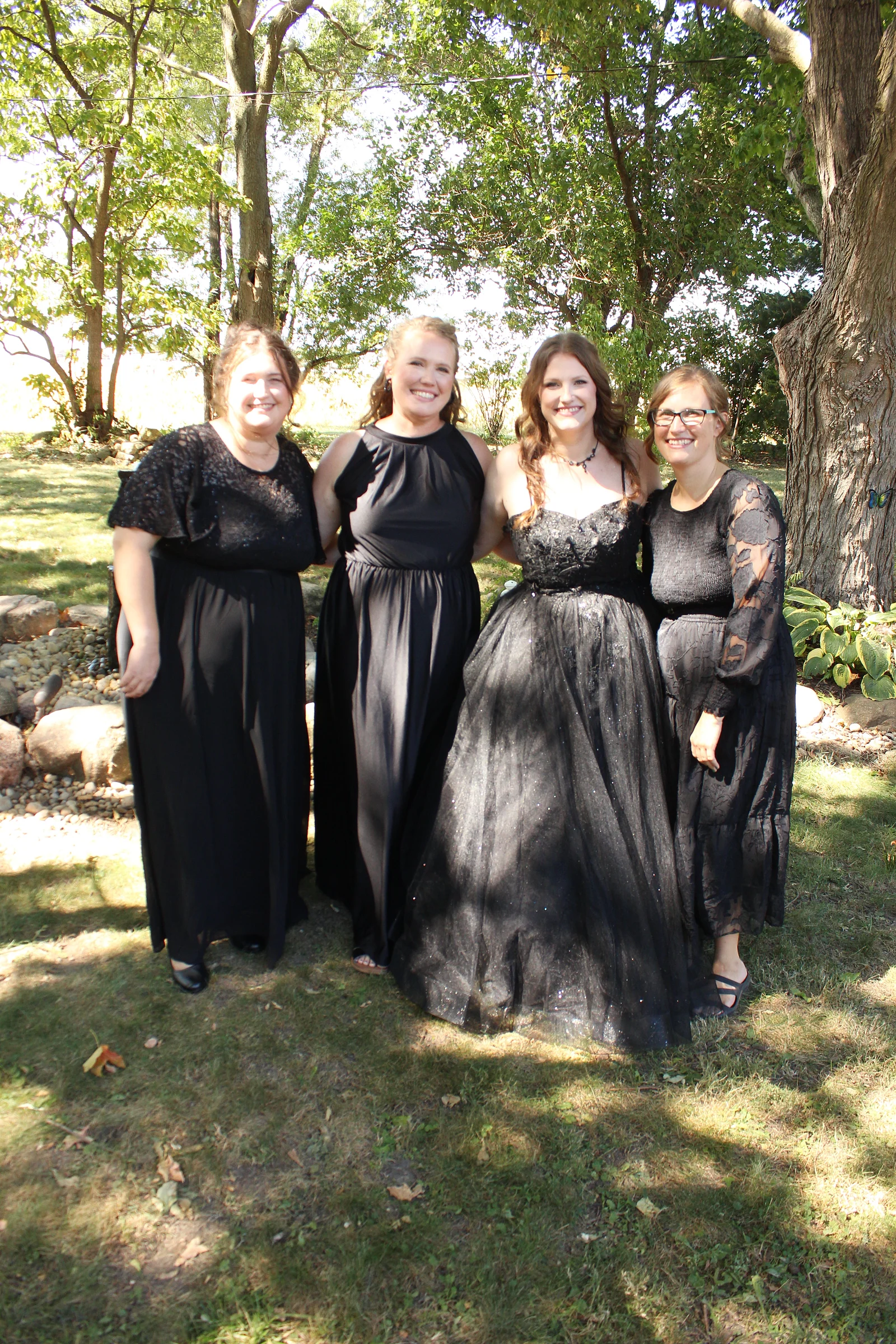 The bridesmaids in black
