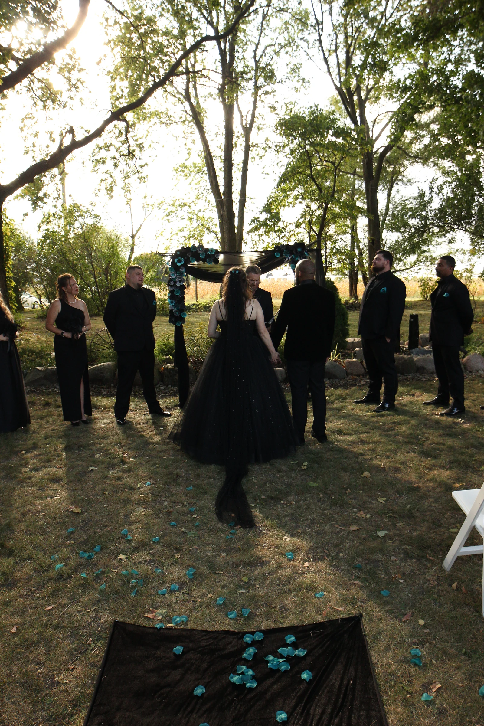 The ceremony, petals down the aisle