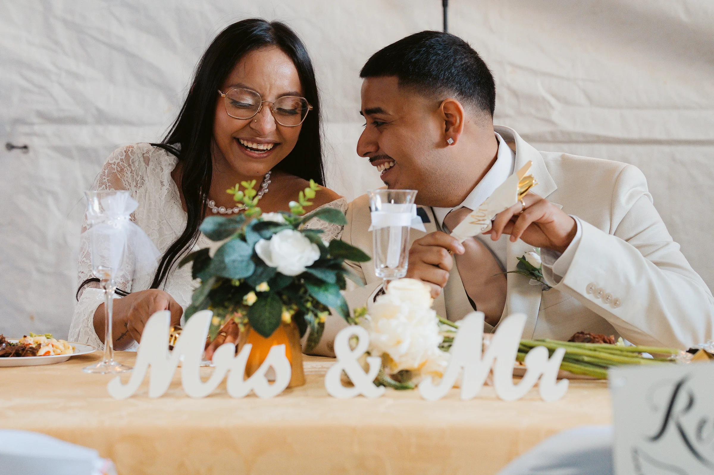 A toast at the sweetheart table