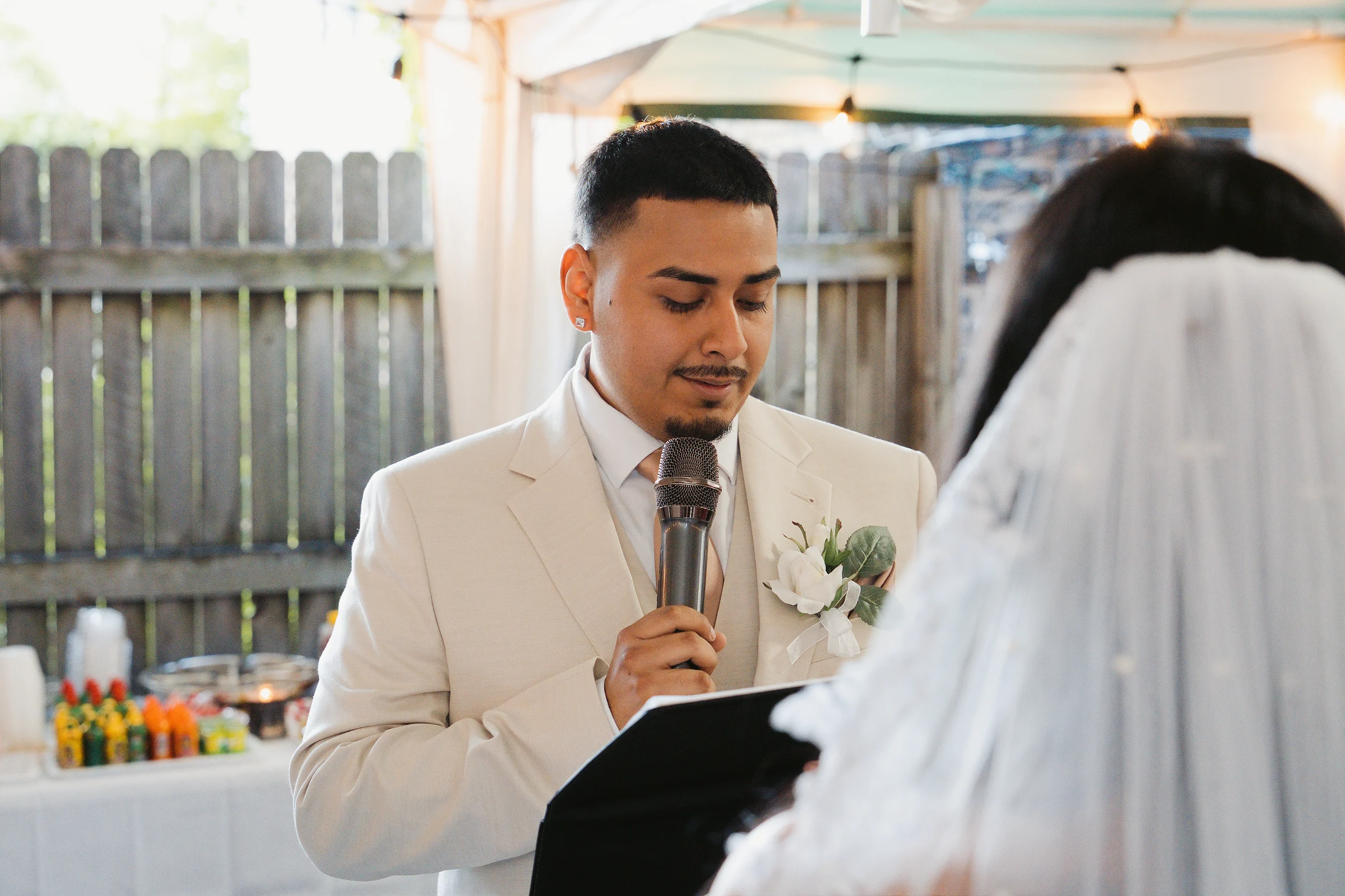 The groom reading his vows