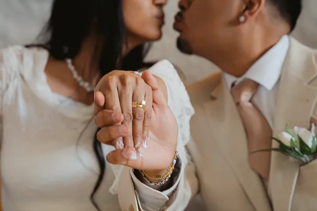 Rings and hands, close