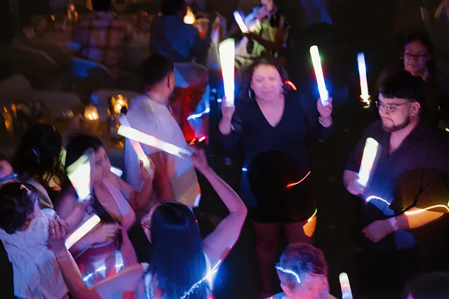 The crowd lit blue