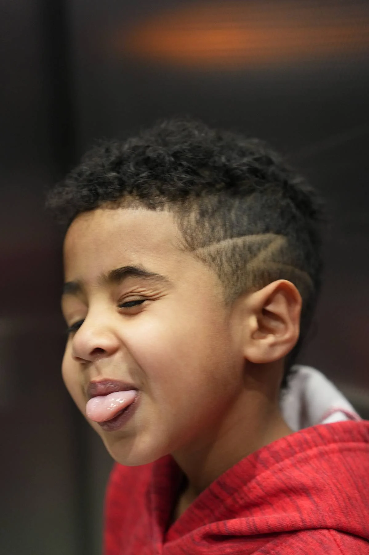 Tongue out, laughing